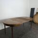 Louis XVI style dining table with a leather top.