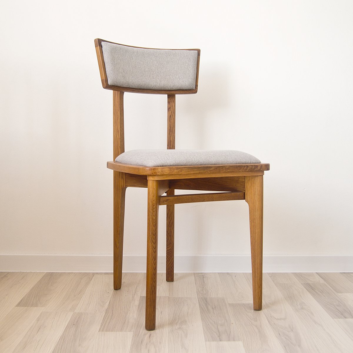 Set of oak dining chairs, France, in the 1950s