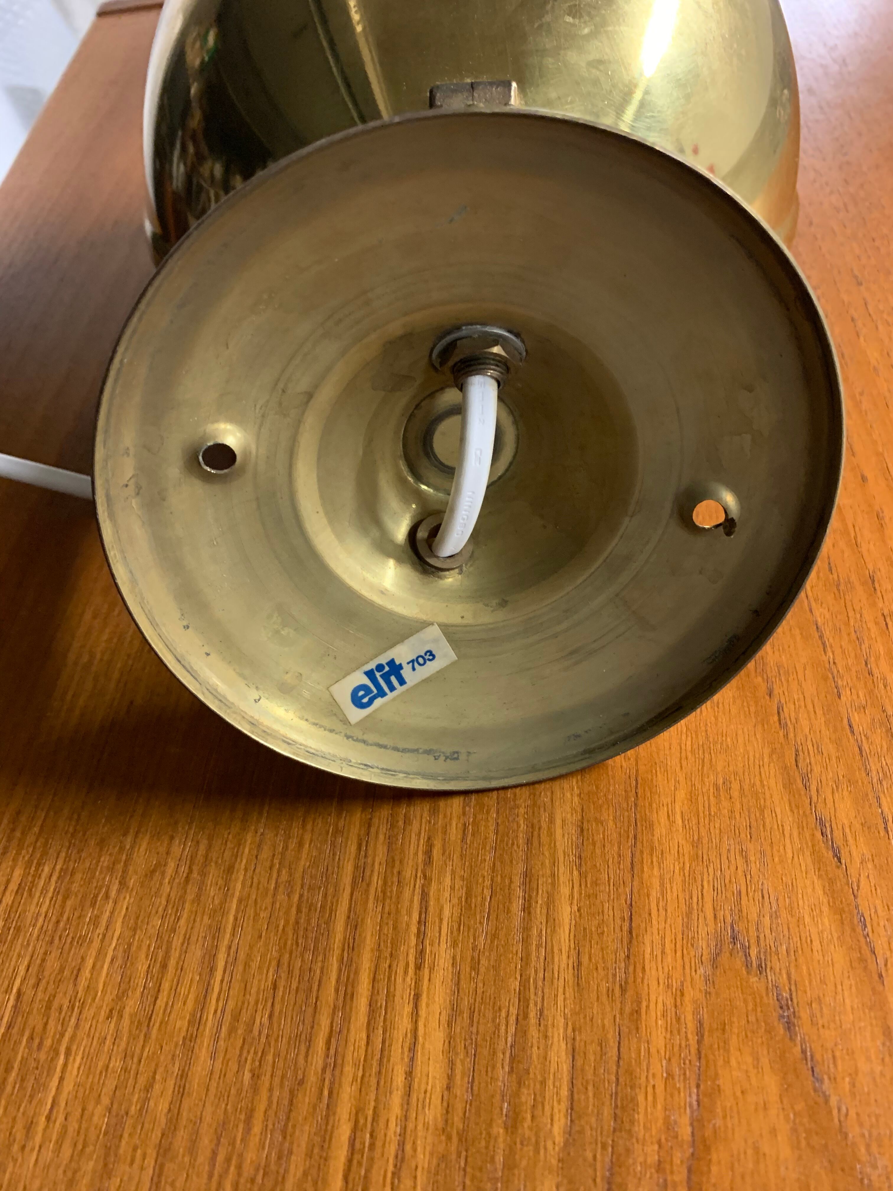 Pair of Danish brass wall lamps by Knud Christensen 1970