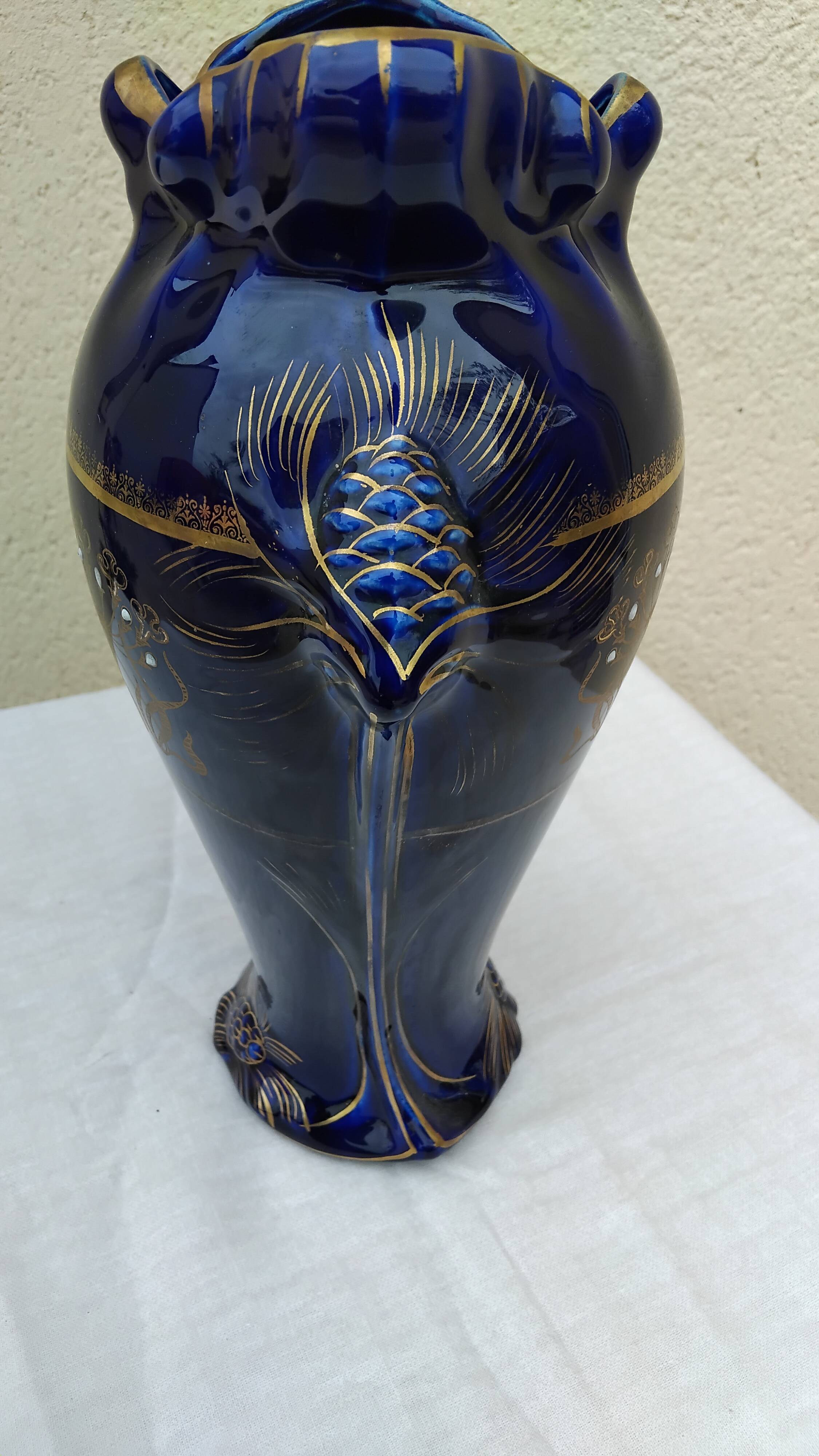 Large antique blue earthenware vase