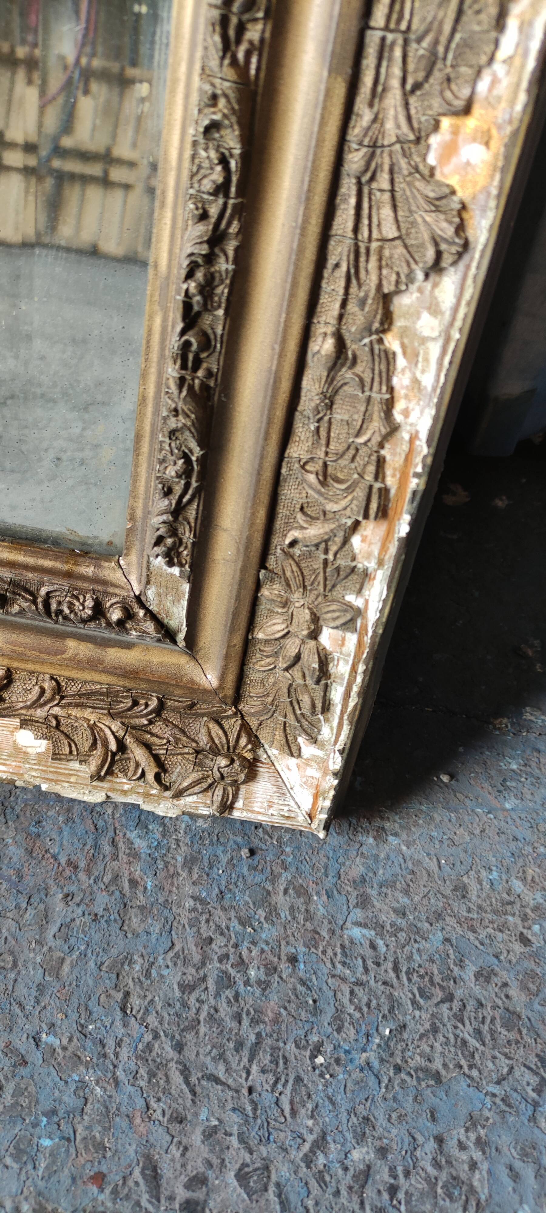 Old beveled mirror, faded castle decoration
