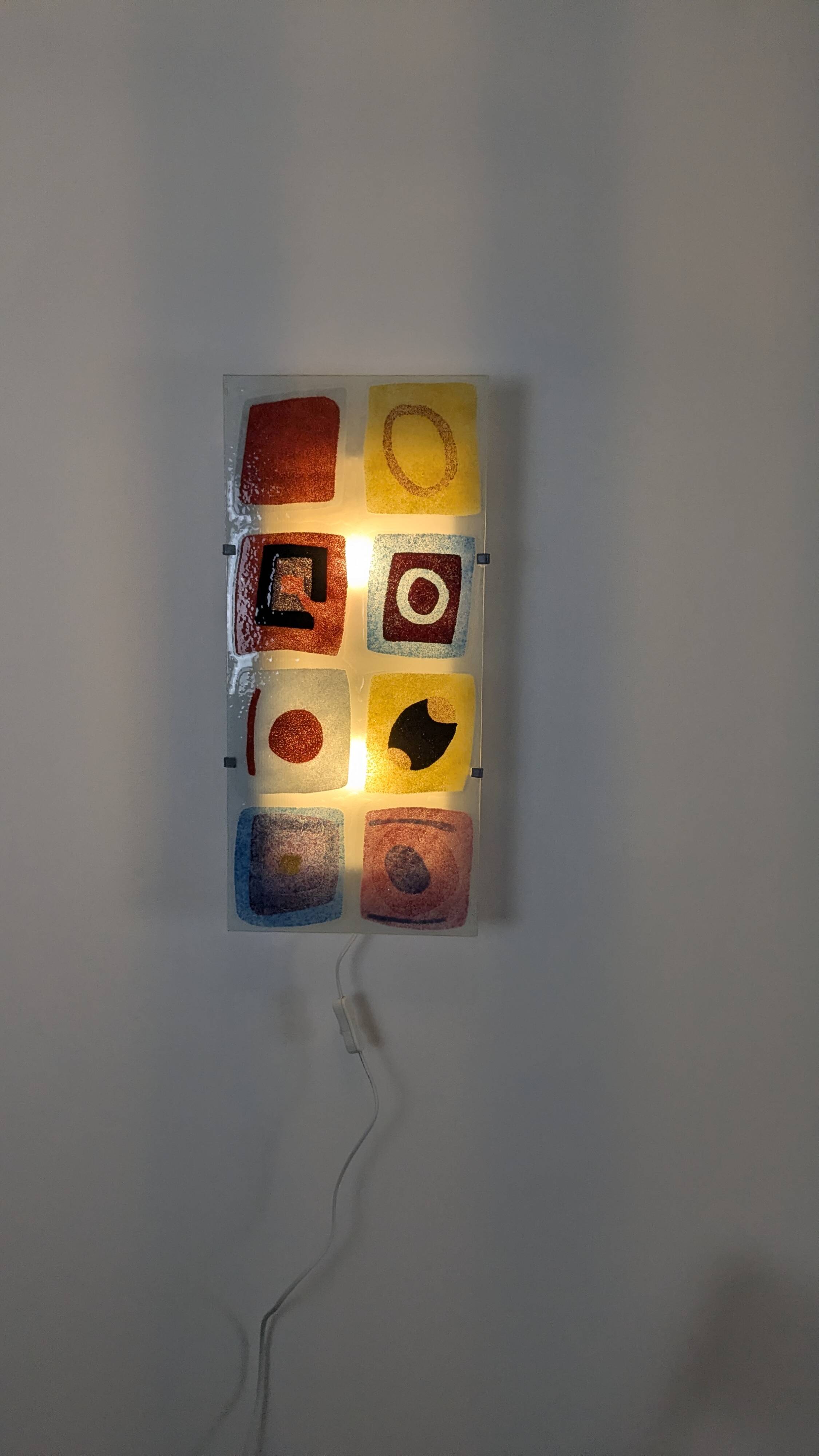 IKEA Gyllen wall lamp in decorated glass, Scandinavian design.