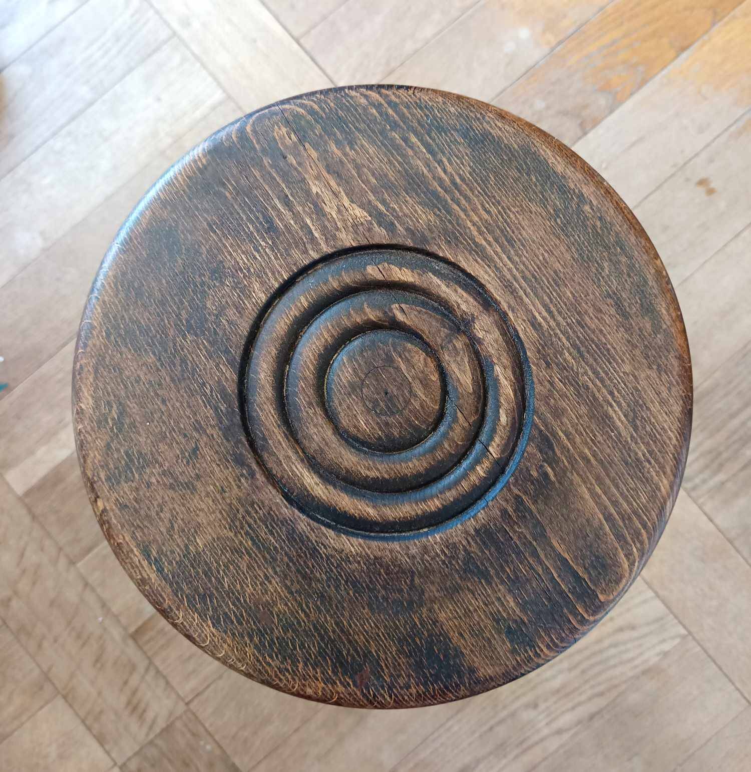 Brutalist tripod stool with twisted legs