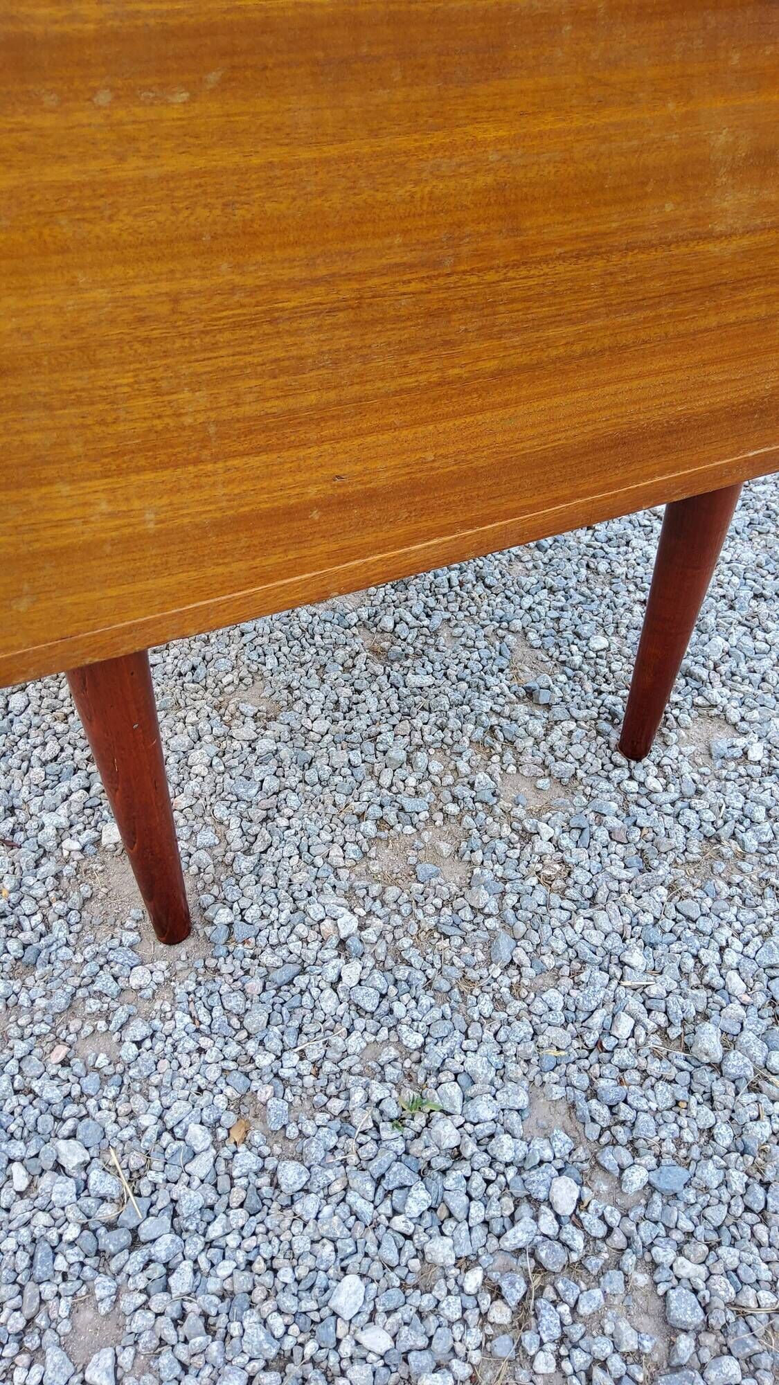 60s desk in golden blond mahogany with conical coffered feet