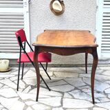 Solid wood table with curved legs