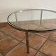 Table basse Space age. 1970. Acier chromé et verre.