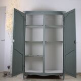 Renovated Parisian wardrobe – sage green with white patina