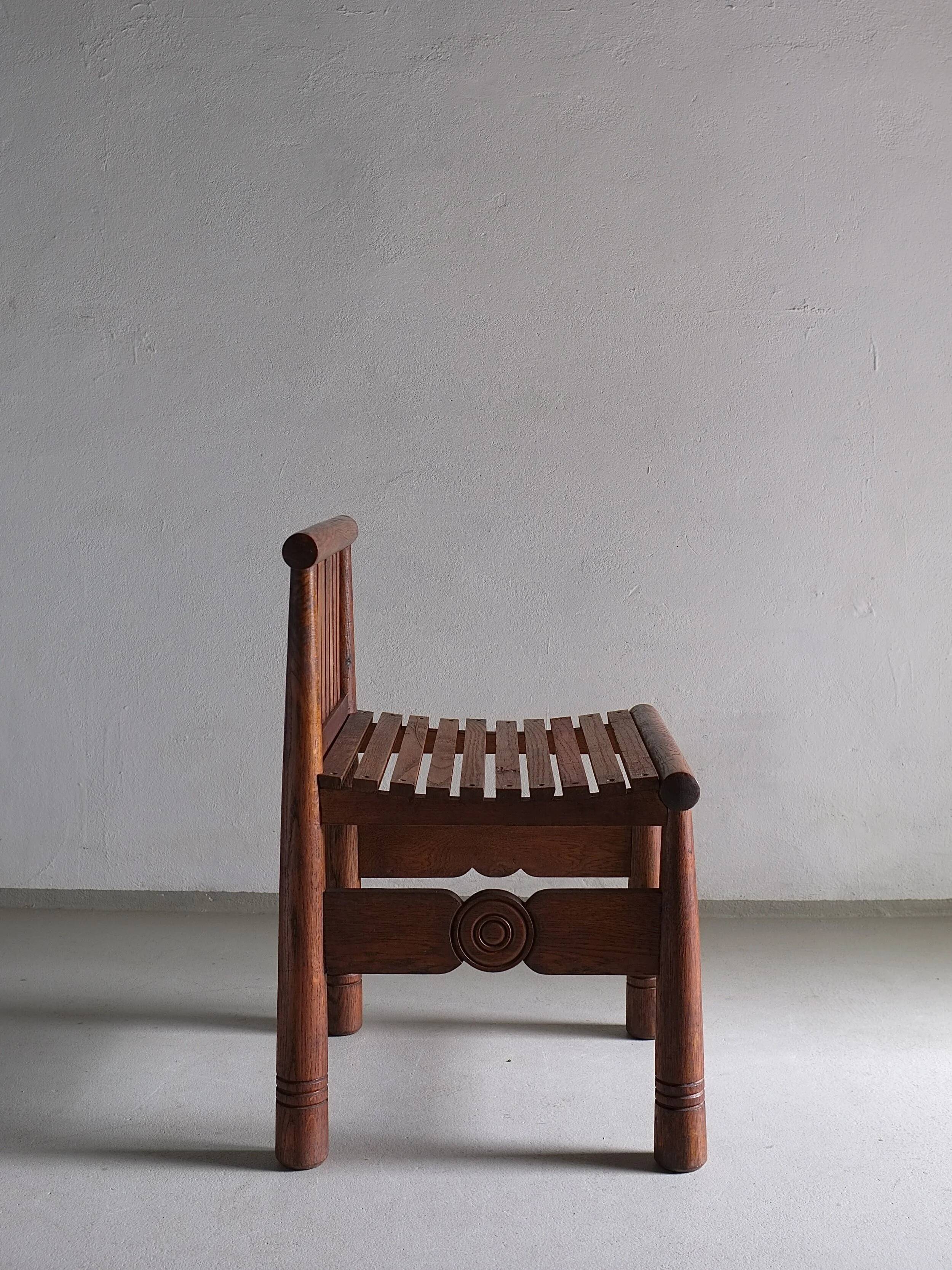 Carved oak low back chair | France | 1960s