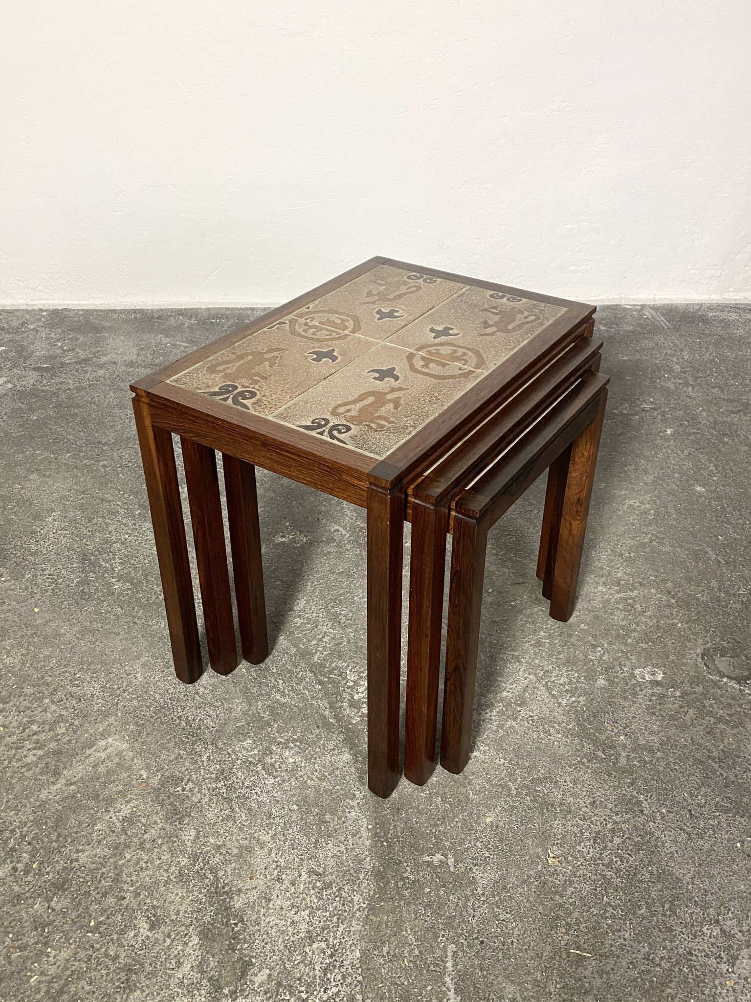 Danish nesting tables in rosewood and ceramic by Willy Ryomgard, Mo.