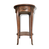 Oval bedside table from the Transition period in marquetry and bronze.