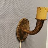 A set of wall lamps in solid brass