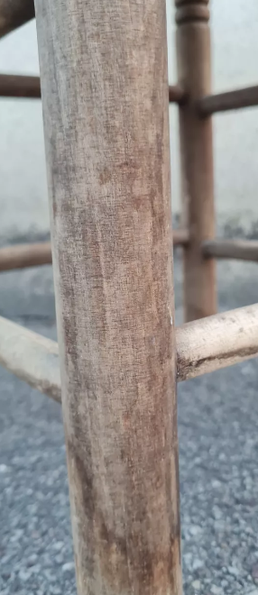 Vintage handmade wooden stool and rope