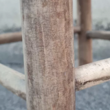 Vintage handmade wooden stool and rope