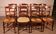 set of 8 rush-seated chairs in cherry wood