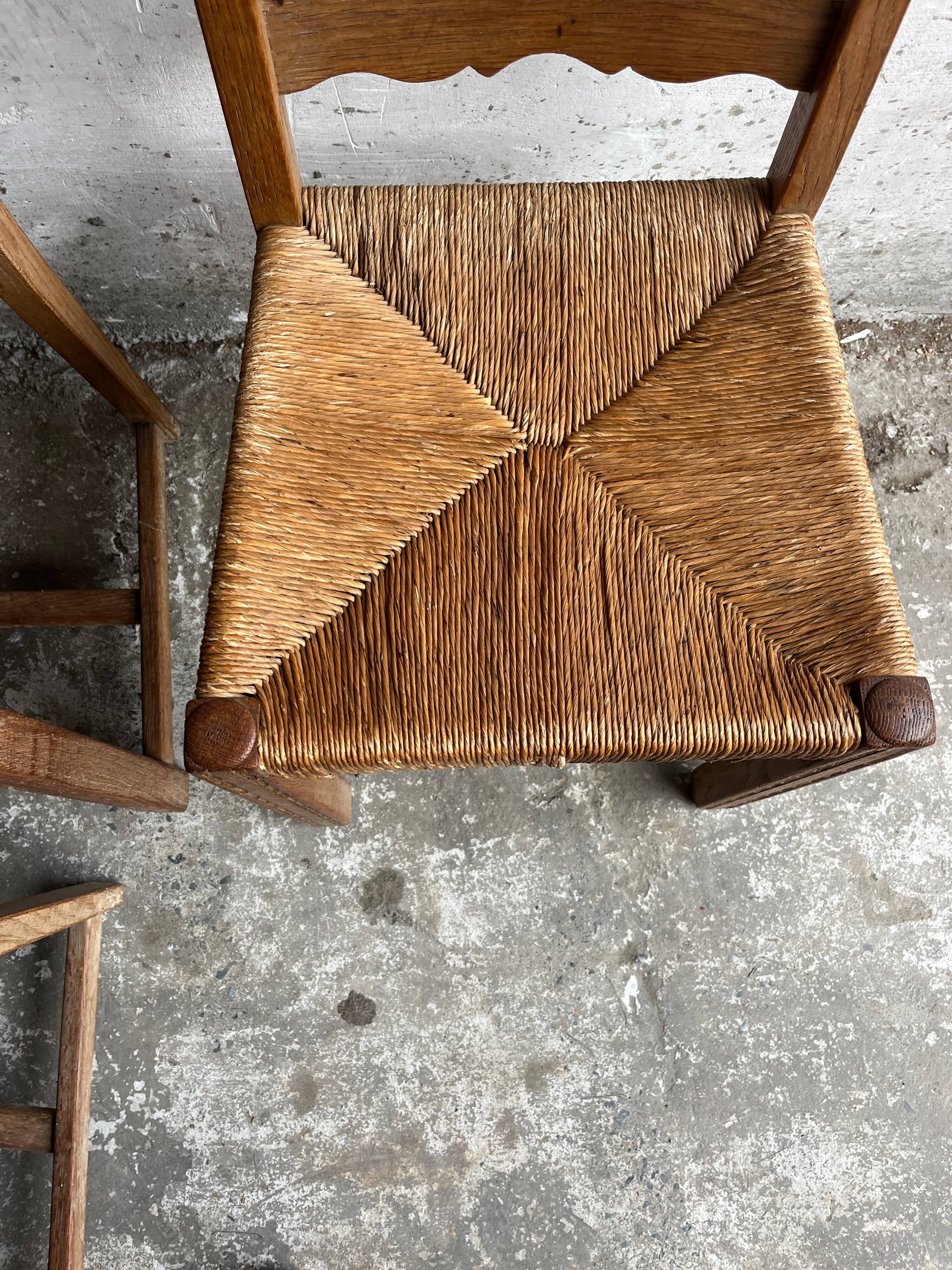 Set of 6 sculpted oak chairs with straw seats – 1950s
