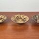 Bowls and candle holders in Danish studio pottery from the mid-century modern period by Michael Andersen Keramik, 1960s, set of 3.