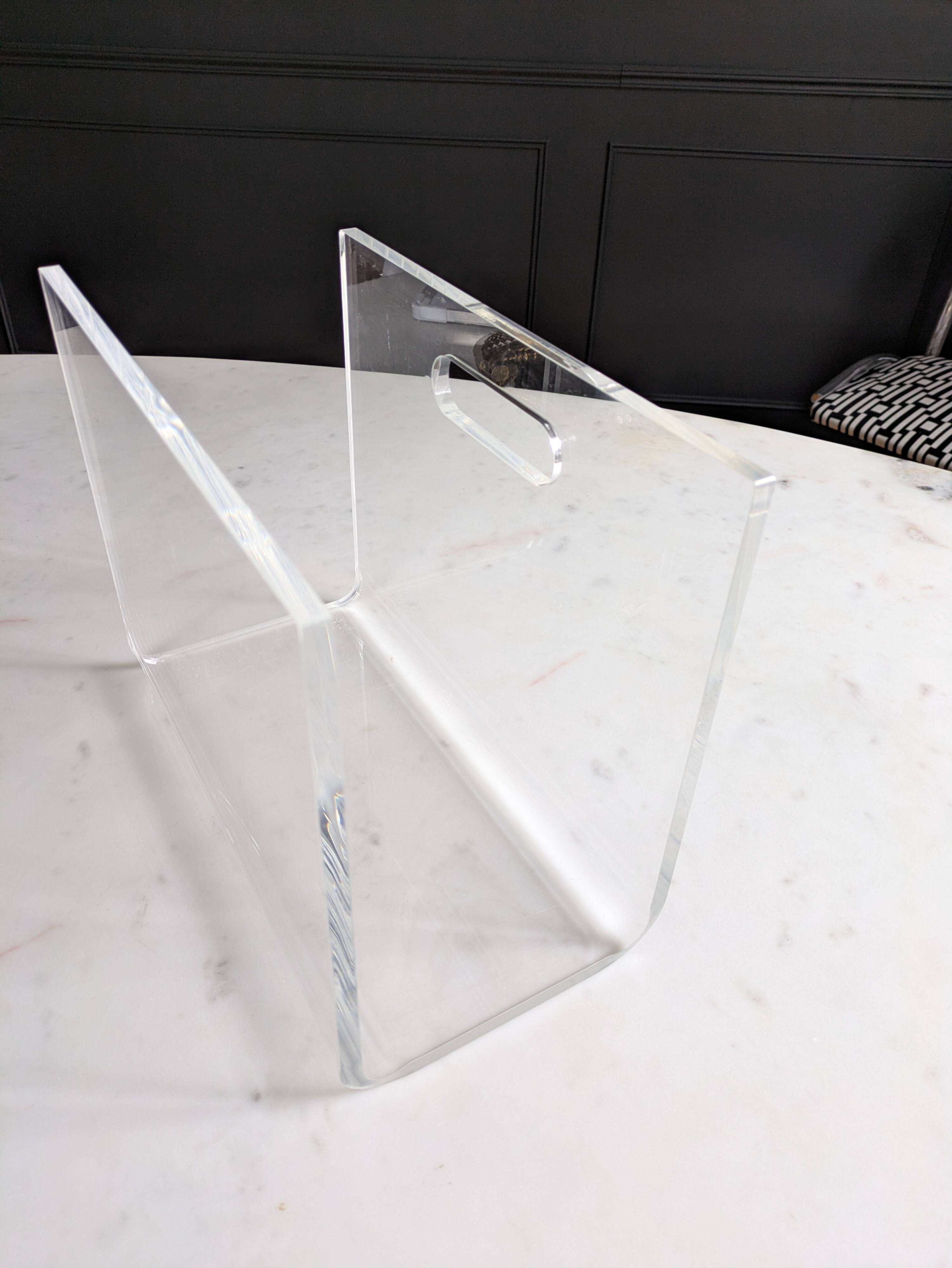 Plexiglass magazine rack by David Lange