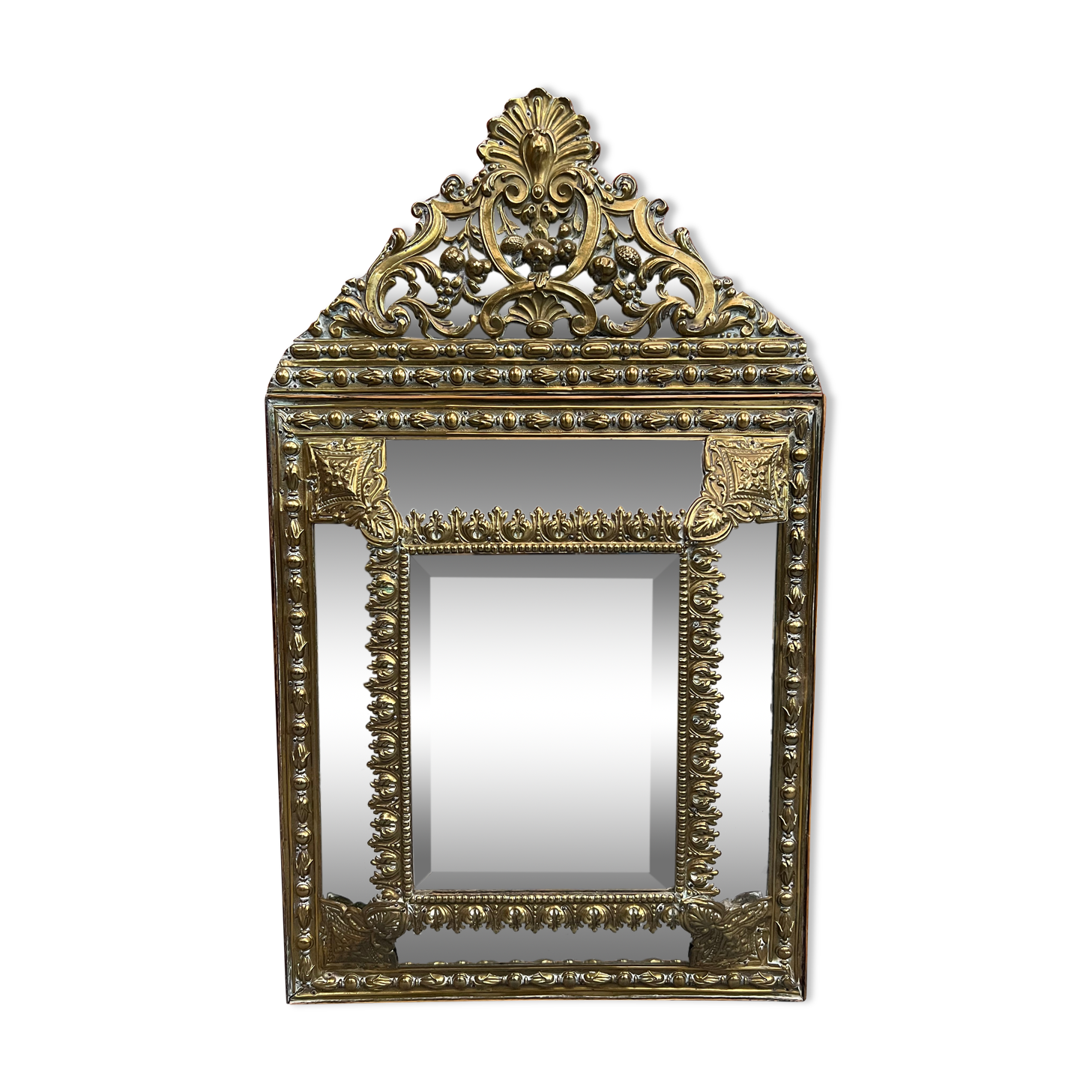 Old repoussé brass pareclose mirror
