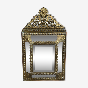 Old repoussé brass pareclose mirror