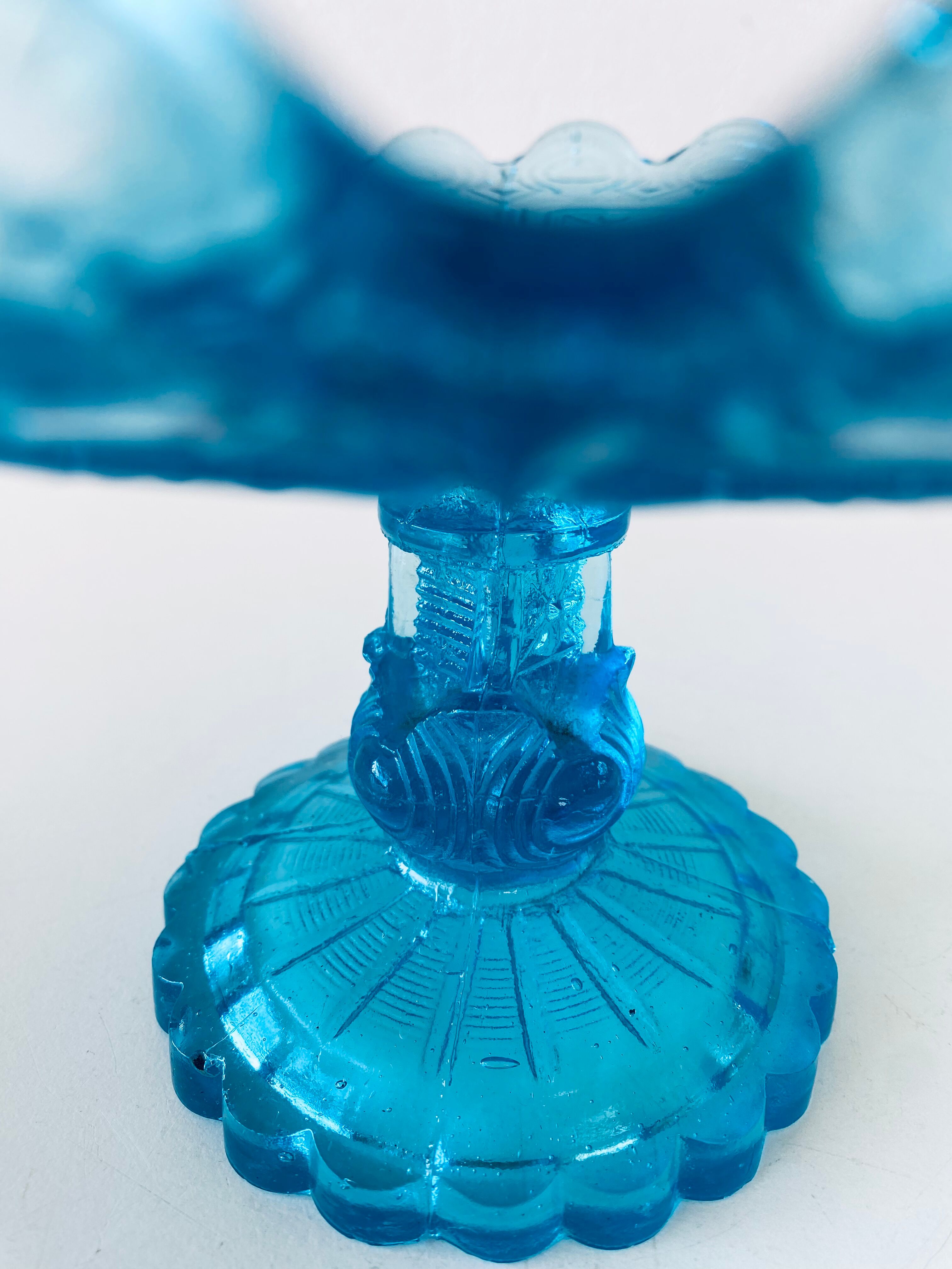 Blue glass stand cup