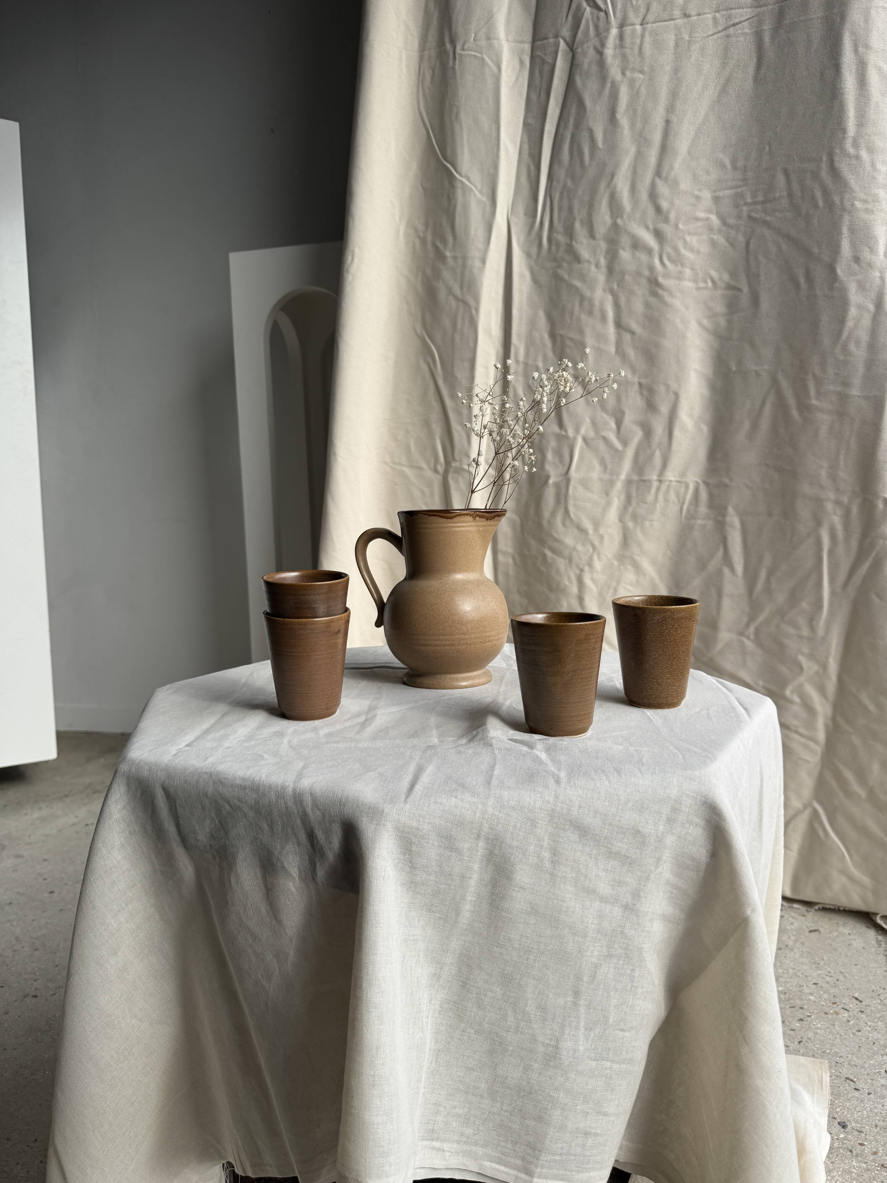 Set of 10 small stoneware mugs from Digoin.