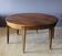 Louis XVI belt table with extensions in walnut, 19th century.