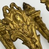 Paire de porte-embrasses en bronze dorée style Rocaille