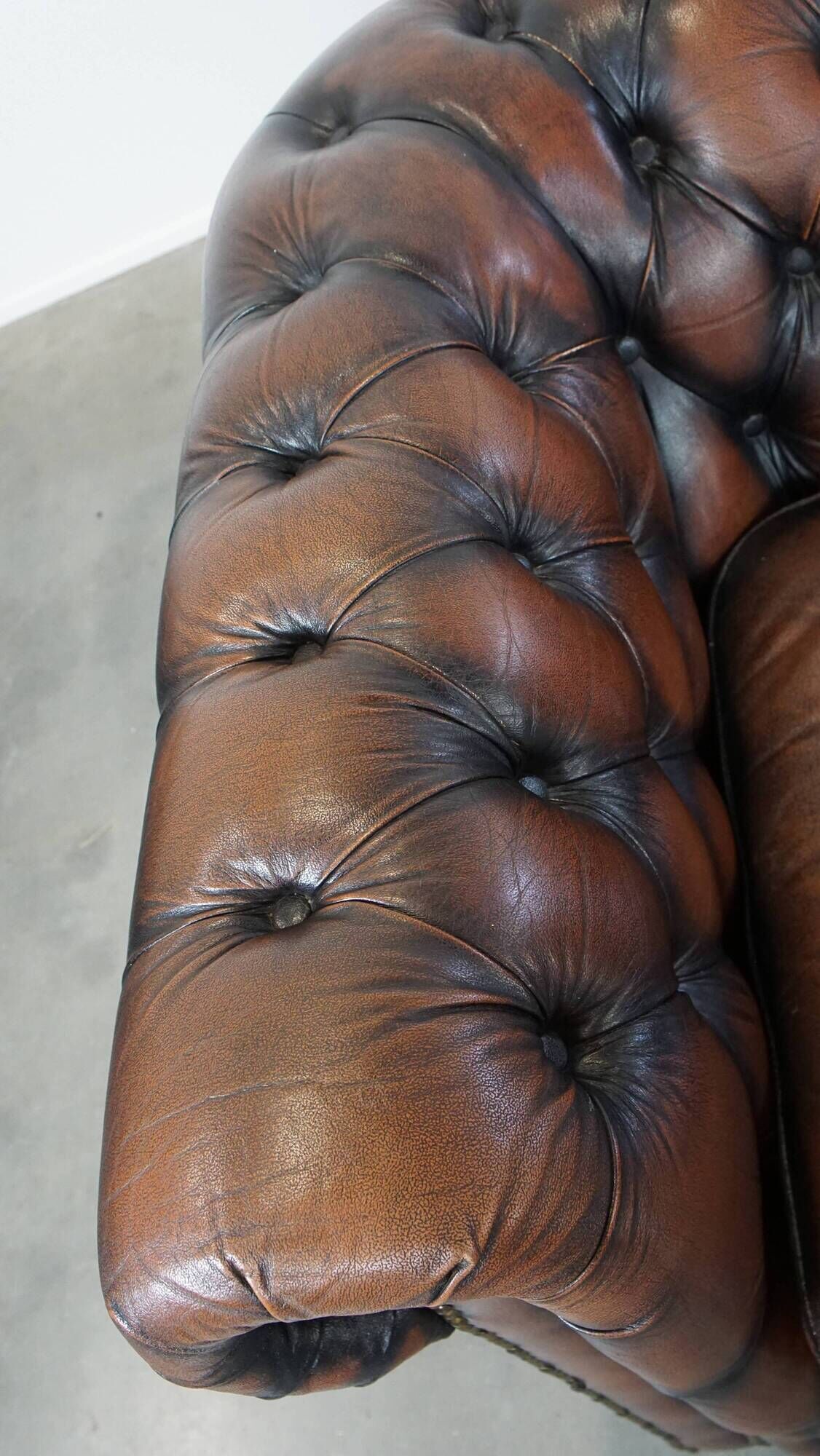 Classic English Chesterfield 2.5 seater sofa in brown cowhide