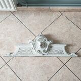 Old pediment in painted wood