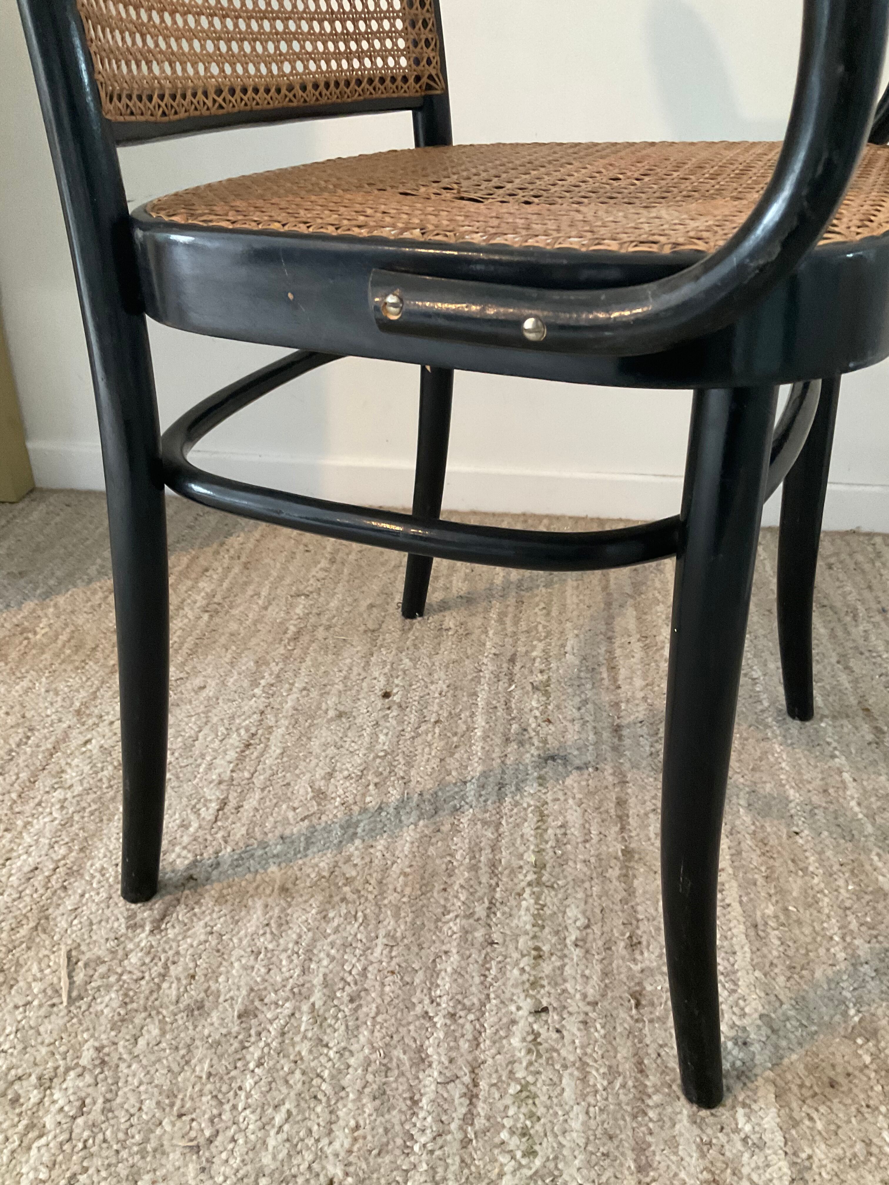 Canned bistro armchair and curved wood from the 60s
