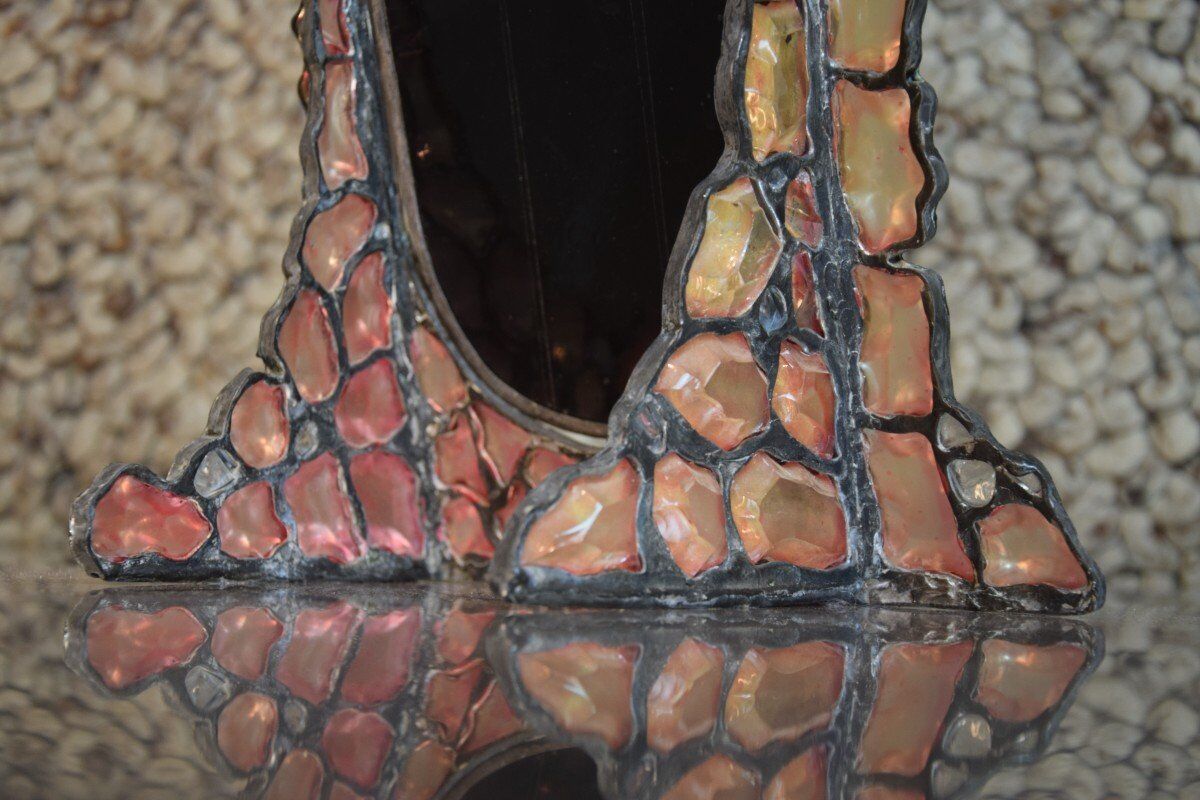 Tinted glass and lead mirror