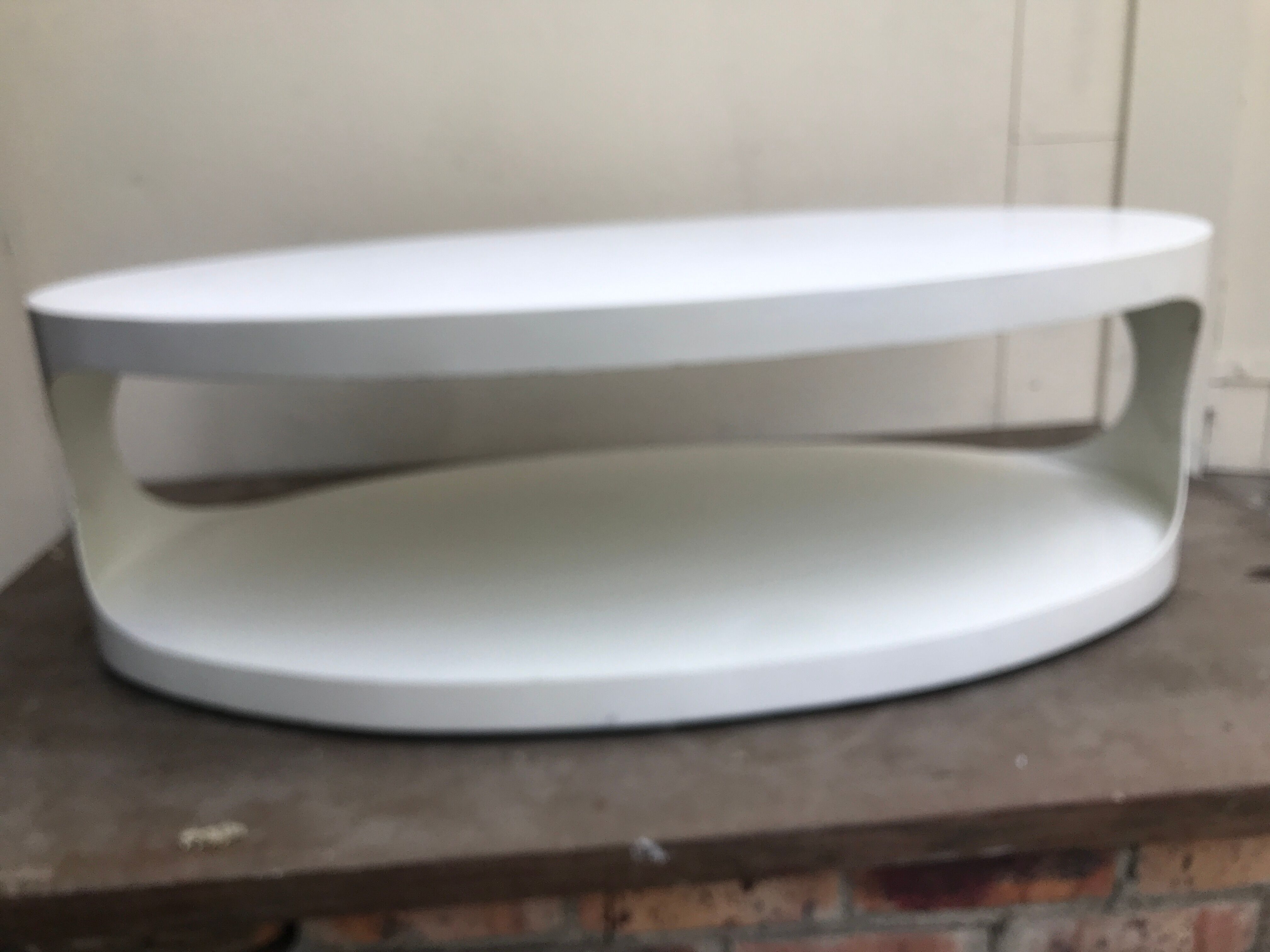 Oval white-panelled metal coffee table 70s