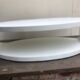 Oval white-panelled metal coffee table 70s