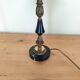 Table lamp base candlestick in chiselled brass and marble base.