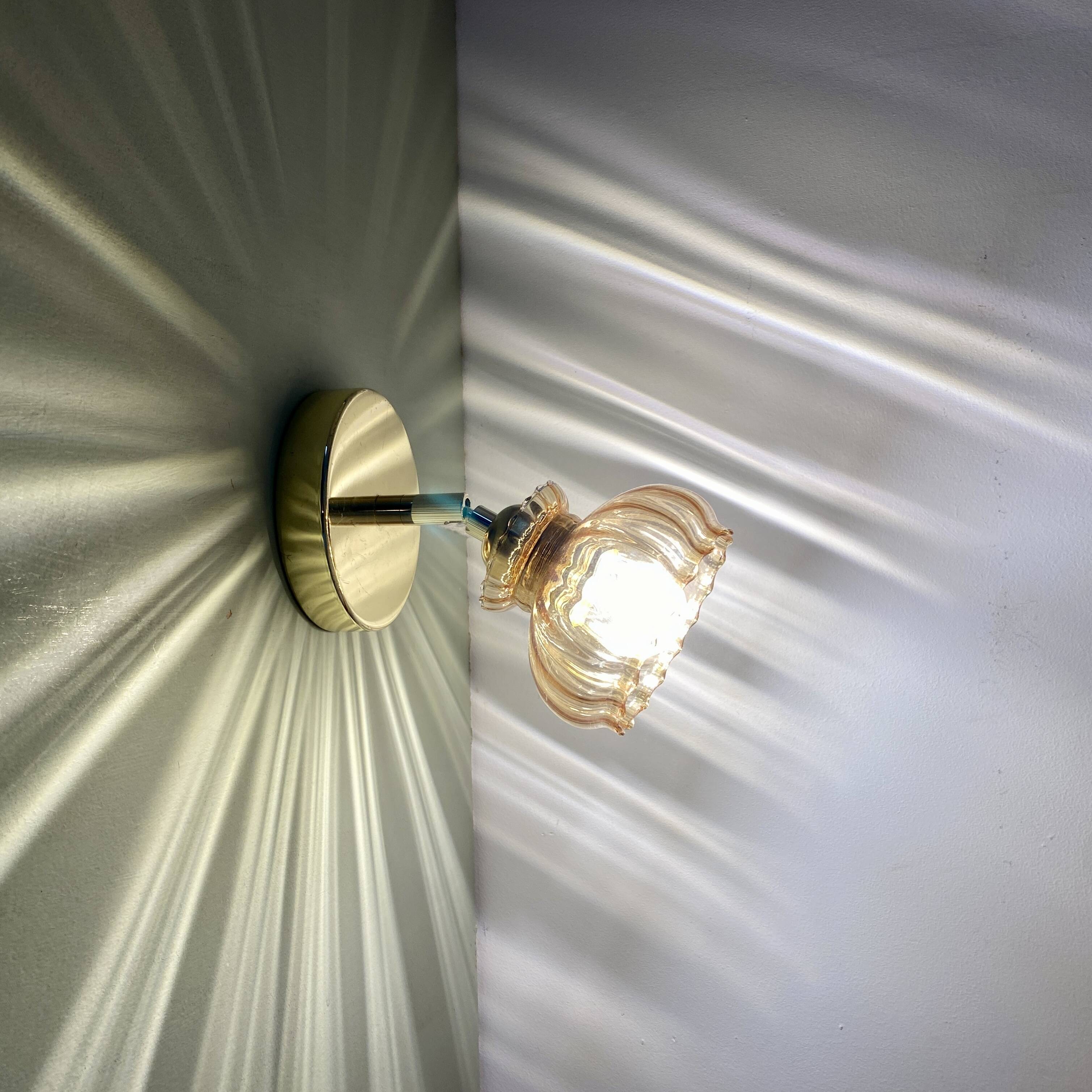 Vintage amber glass globe wall light