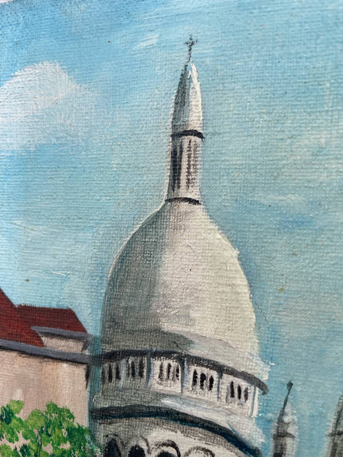 Old oil painting depicting a street in Montmartre