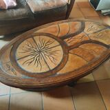 Ceramic and wood table in the shape of trees in the style of capron style