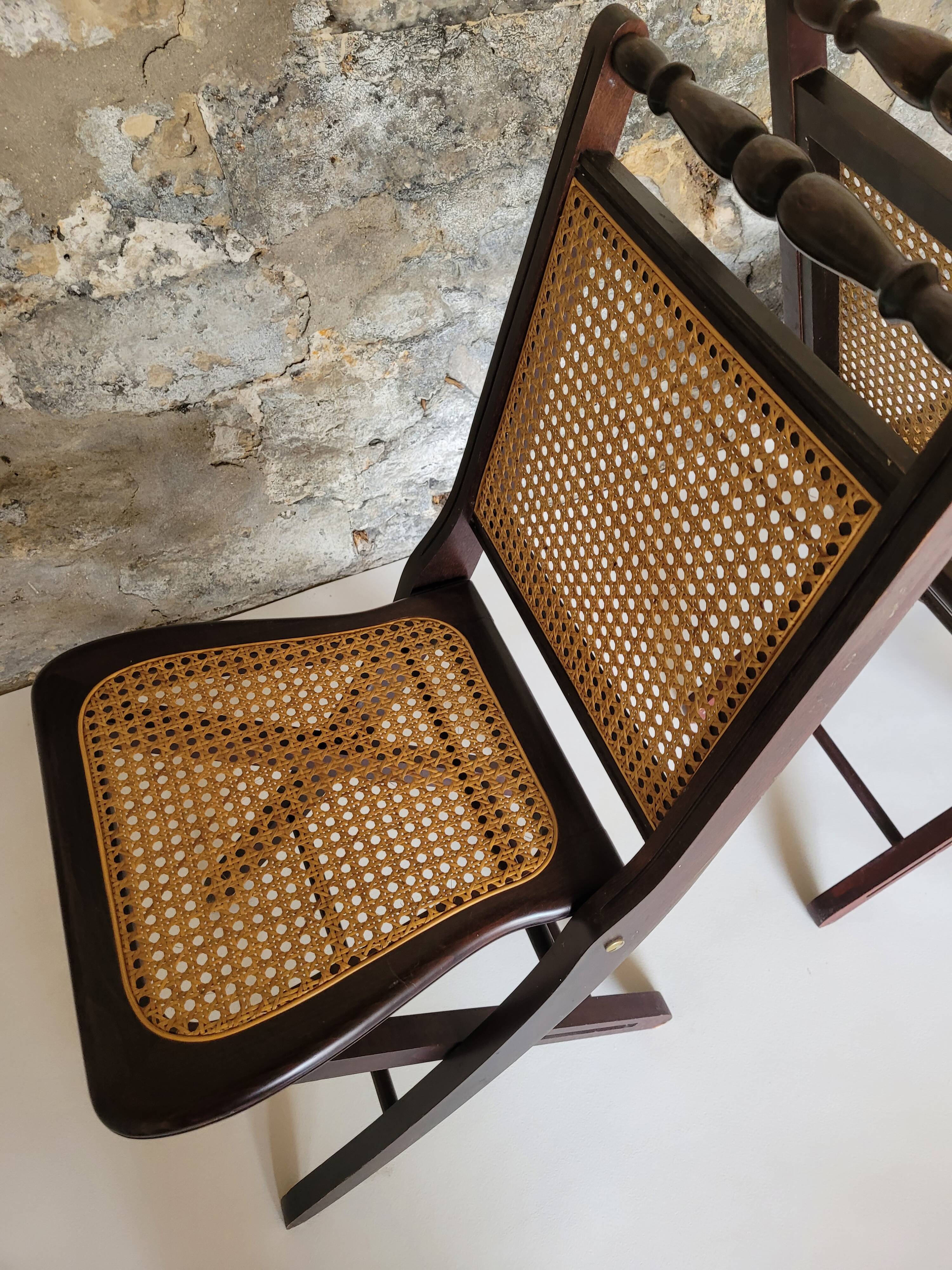 Pair of folding cane chairs