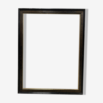 Black and gold frame decorated with Greek frieze decoration