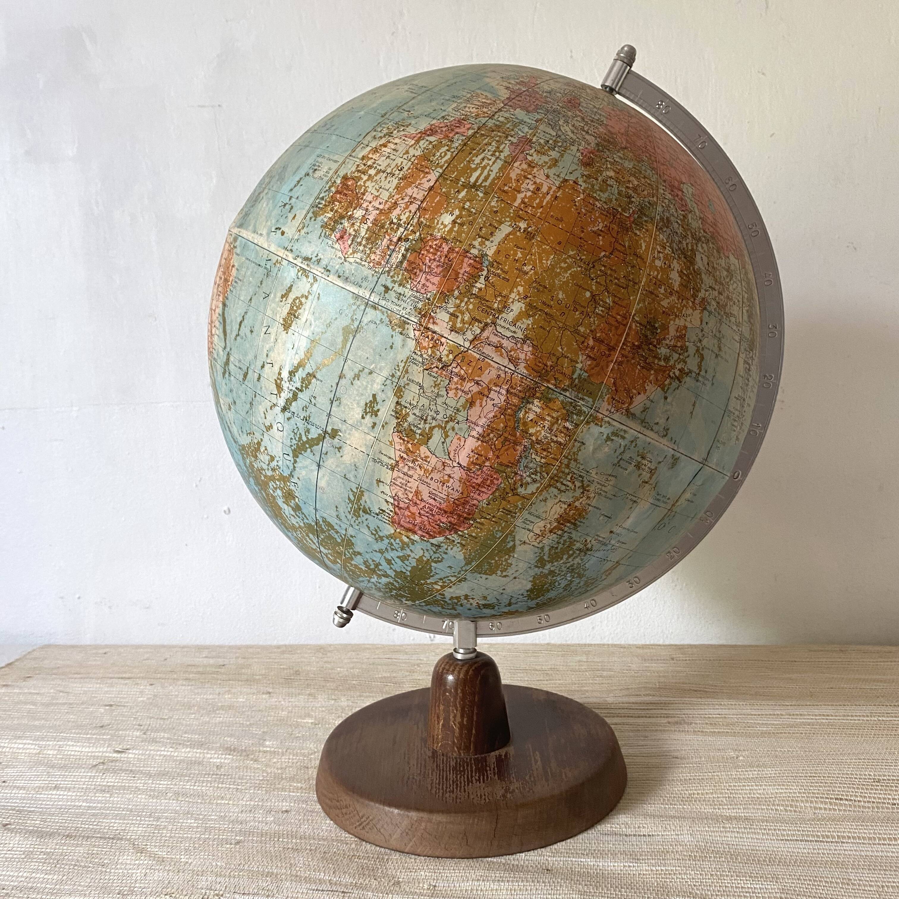 Old terrestrial globe with wooden base H46 cm
