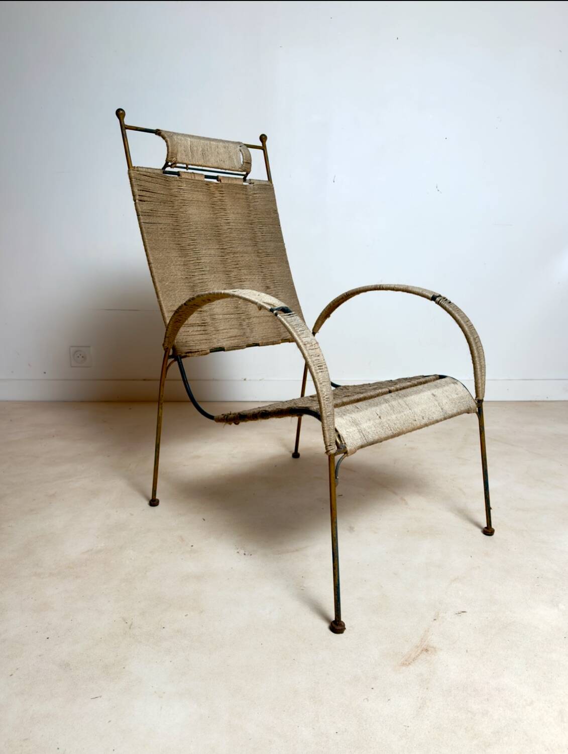 Armchair made of wrought iron and rope