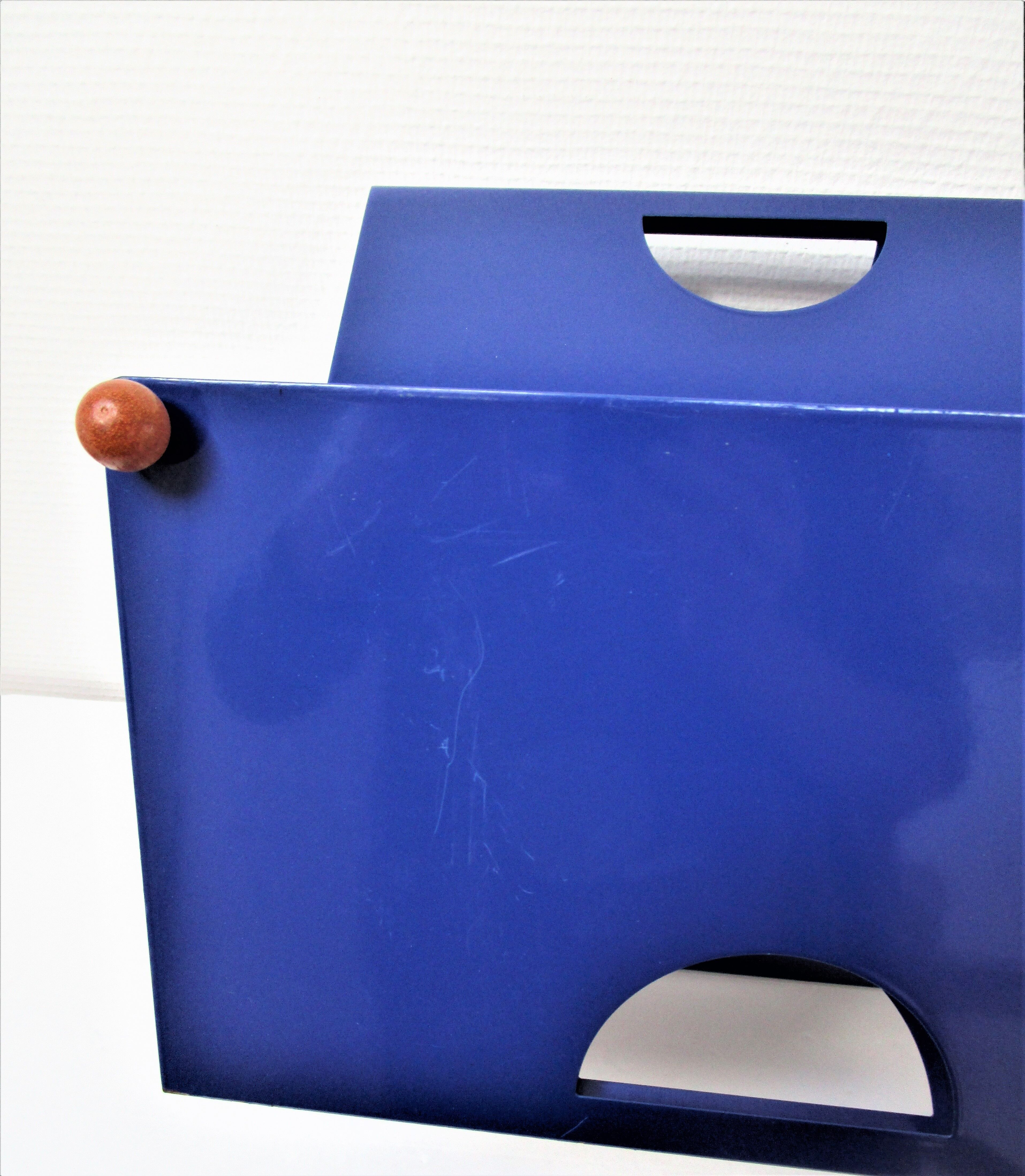 Blue metal magazine holders design 80s