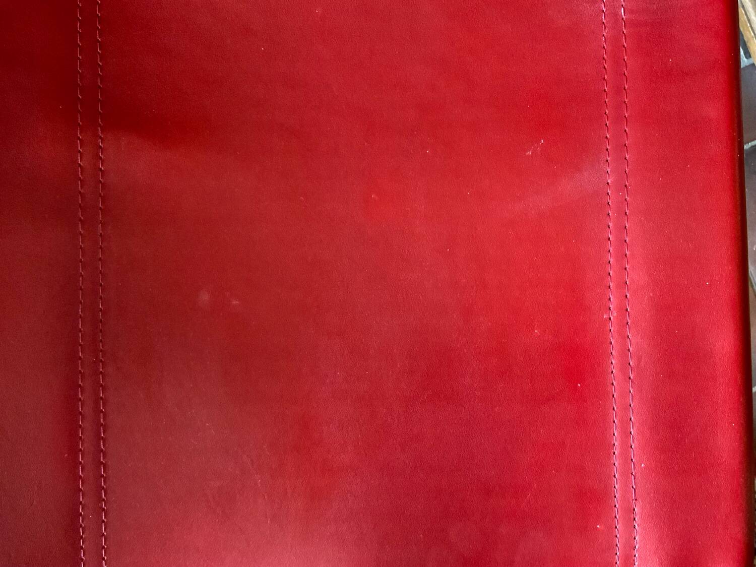 2 tubular chairs in red leather 1970