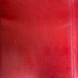 2 tubular chairs in red leather 1970