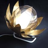 Lampe applique fleur dorée et flute satinée