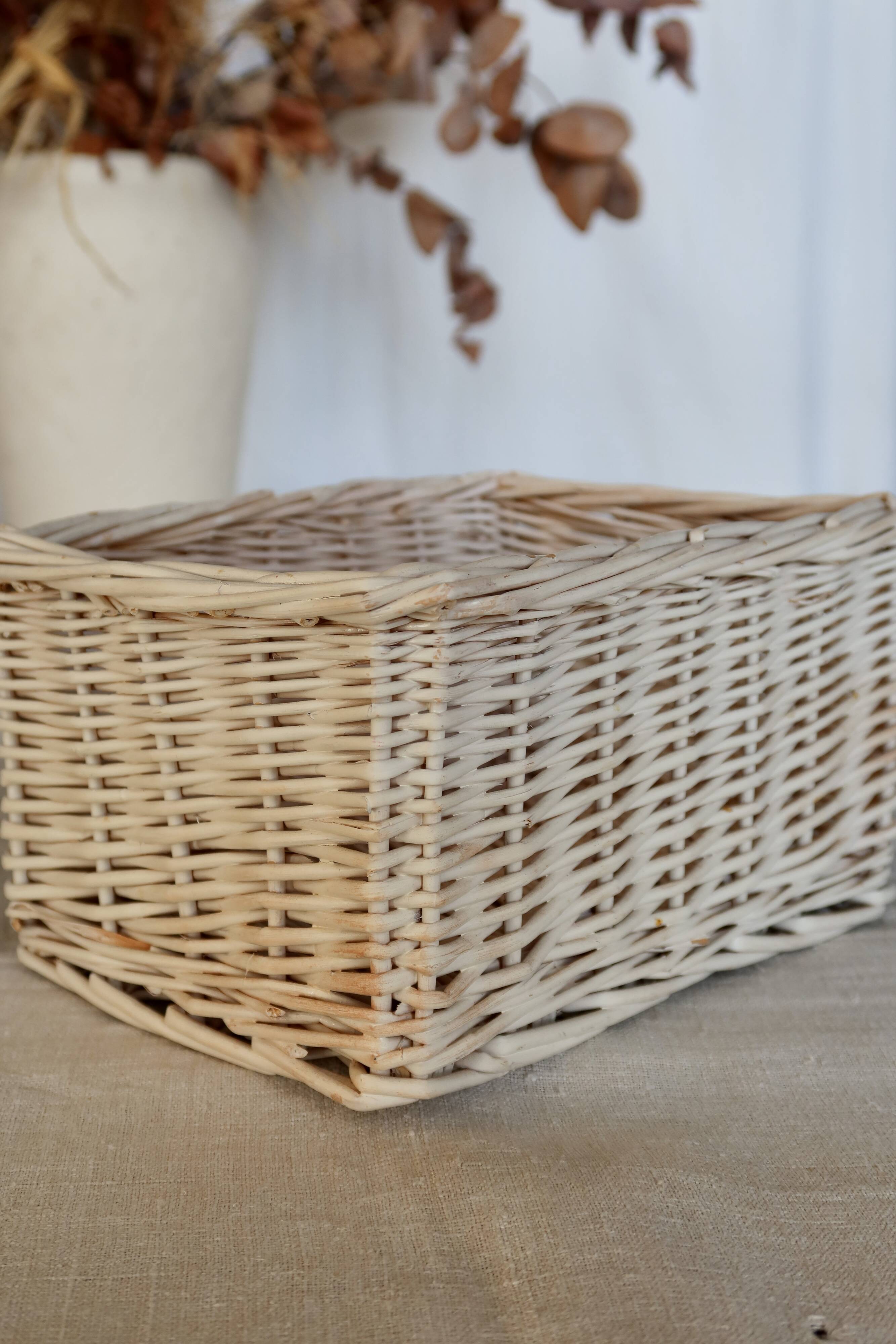 Vintage white wicker storage baskets