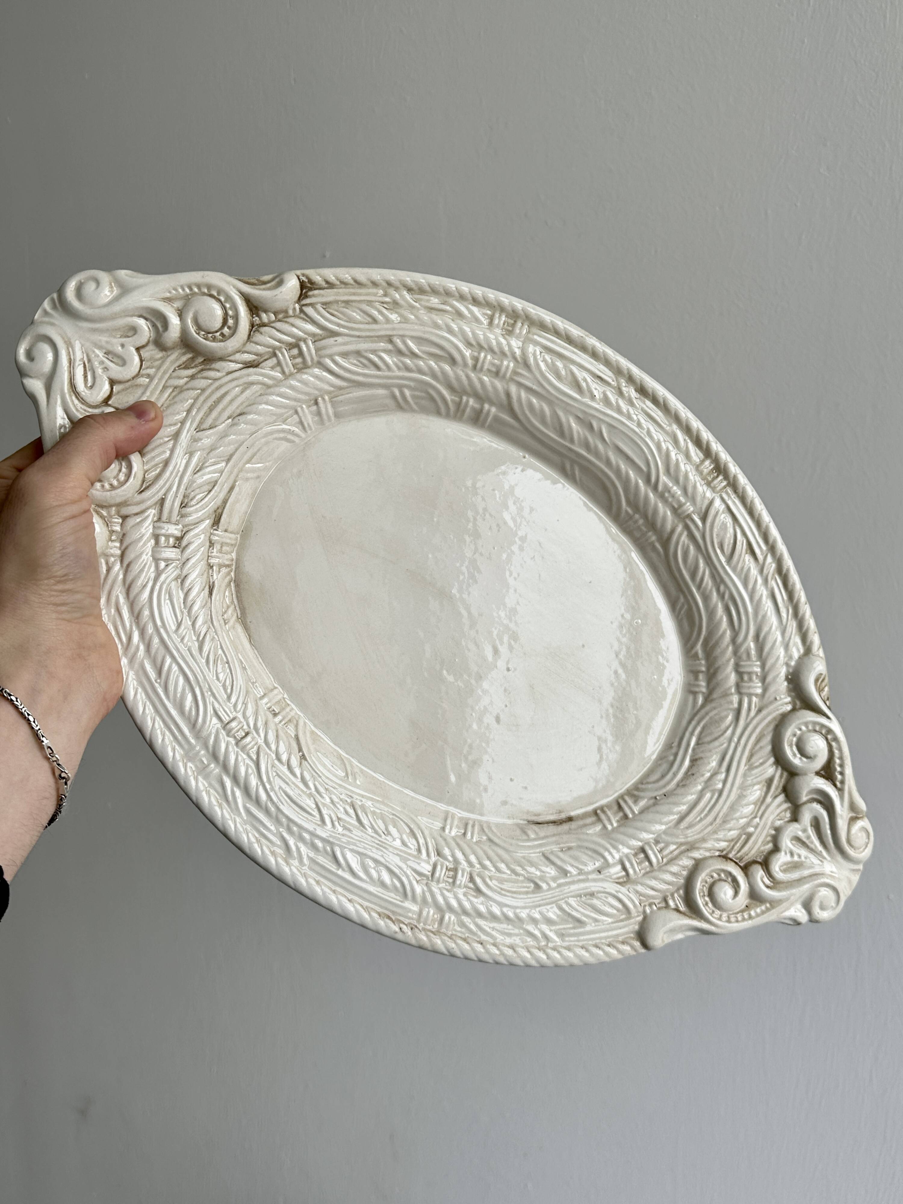 Large oval dish in sculpted white ceramic