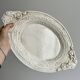 Large oval dish in sculpted white ceramic