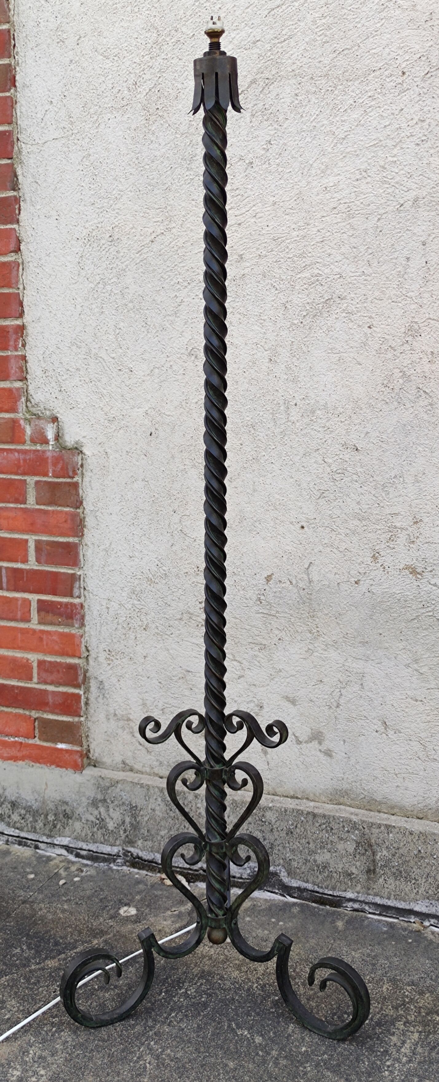 Wrought iron tripod floor lamp
