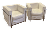 Pair of white leather and chrome armchairs